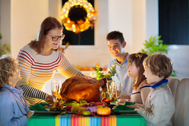 istock Thanksgiving family dinner. Roasted turkey meal. 1728007795