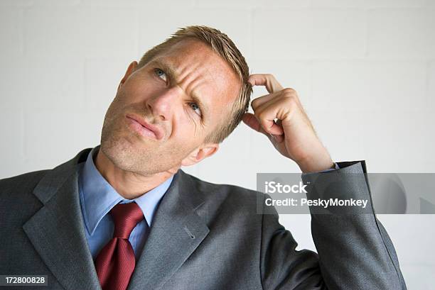 Thinking Businessman Scratching Head Looking Up Stock Photo - Download Image Now - Scratching Head, Adult, Adults Only