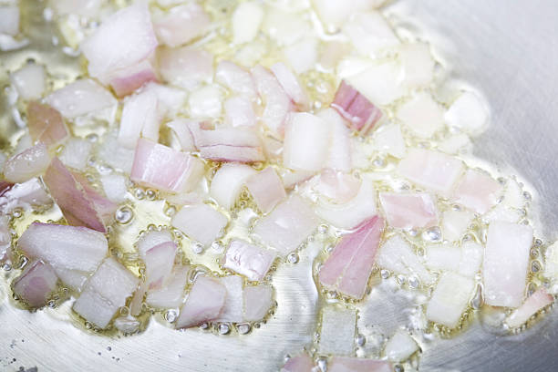 sweat shallots stock photo