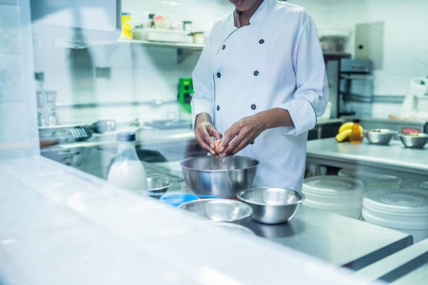istock Chef cooking in a commercial kitchen 1728014889