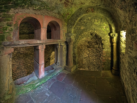 Worms, Germany - May 18, 2013: The entrance to subterranean mikveh of the Worms Synagogue. The first synagogue at the site was built in 1034. It is regarded as the one of the oldest existing synagogue in Germany. The mikveh was constructed in 1186.