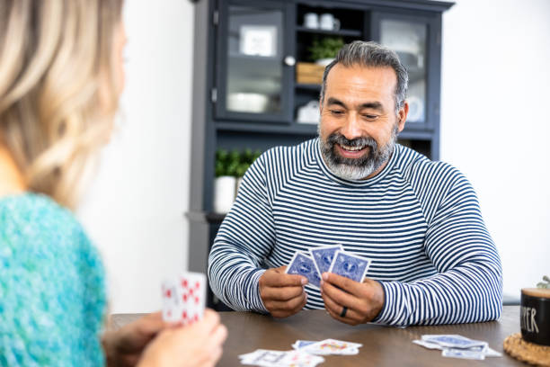 istock Married Mixed Race Couple Playing Games 1728016104