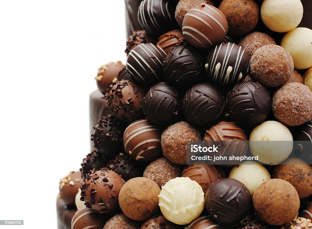 Chocolate truffles on the side of a wedding cake Chocolate Stock Photo