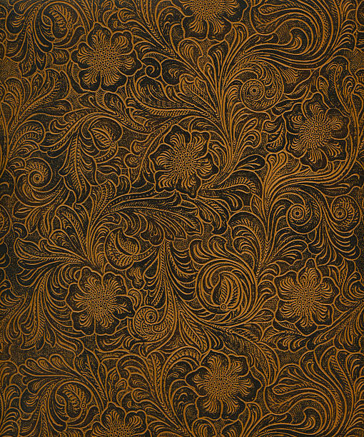 classic pattern on faux leather High resolution classic Art Nouveau woodcut pattern on faux leather surface, works great for antique, ornamental, vintage and more! leather photos stock pictures, royalty-free photos & images