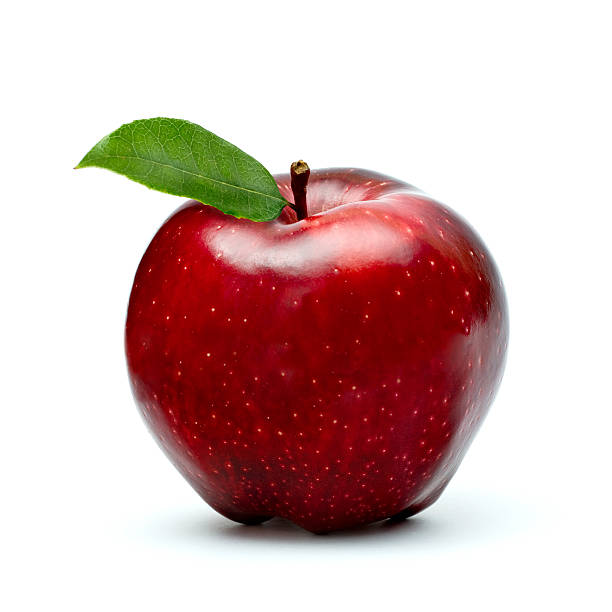 istock ripe red apple with green leaf isolated on white 172802173
