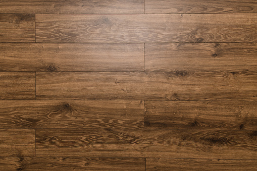 Parquet board background. Wood laminate flooring.