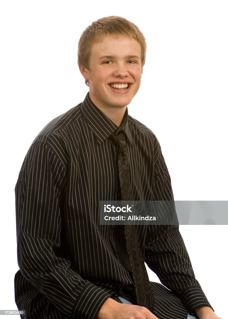 smiling teen in black shirt and tie a smiling young man in a black pin striped shirt and black necktie 16-17 Years Stock Photo