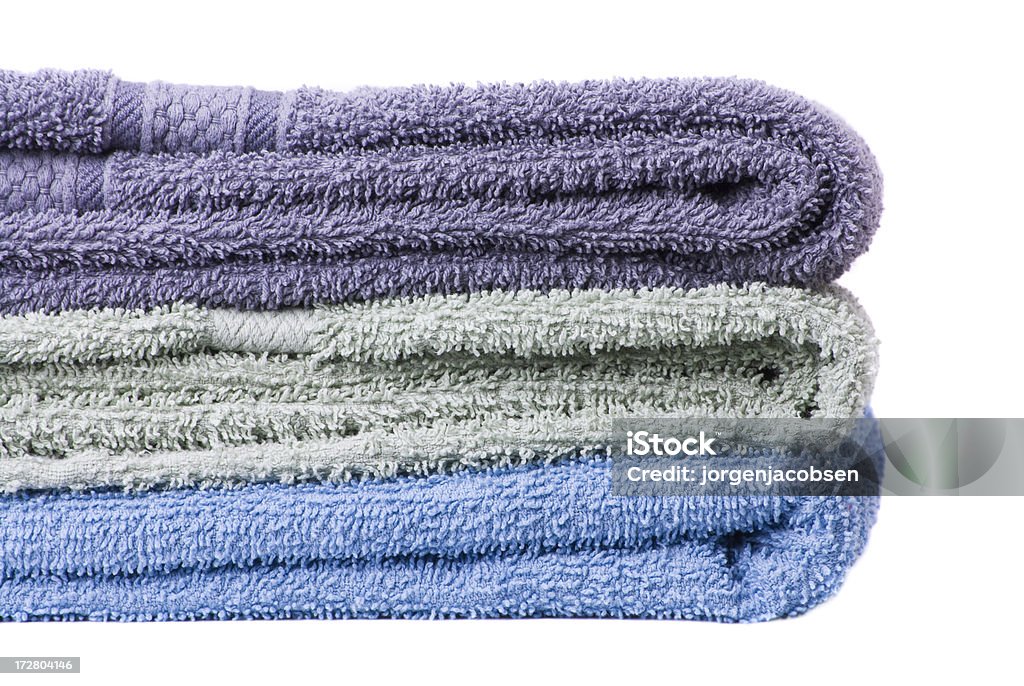 Towels in different color Towels in different color isolated on white background. Bathroom Stock Photo