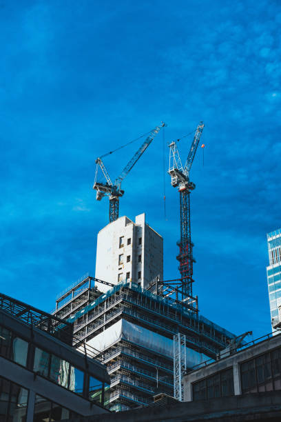 istock Skyscrapers and construction site in London 1728043808