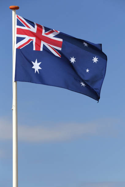 istock Australian flag flying in the wind 1728045511