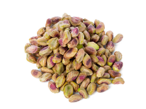 istock Pistachio nuts isolated on white background 1728046090