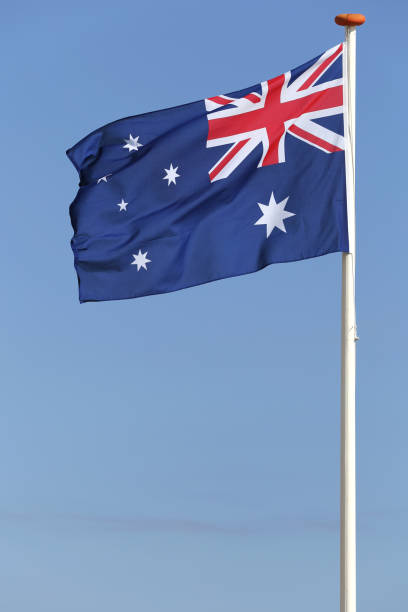 istock Australian flag flying in the wind 1728046139
