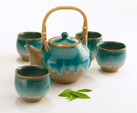 Asian teapot and cups.