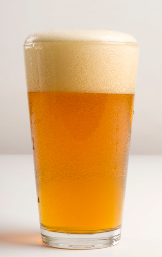 Pint of Pale Ale beer with foamy head. See portfolio for similar images of beers.