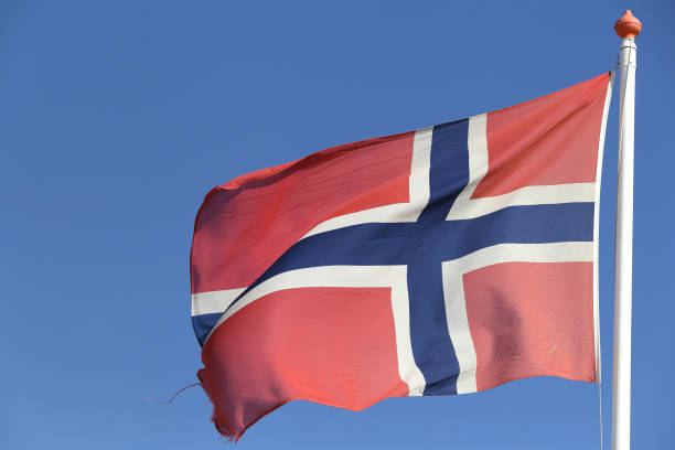 istock Norwegian flag flying in the wind 1728052054