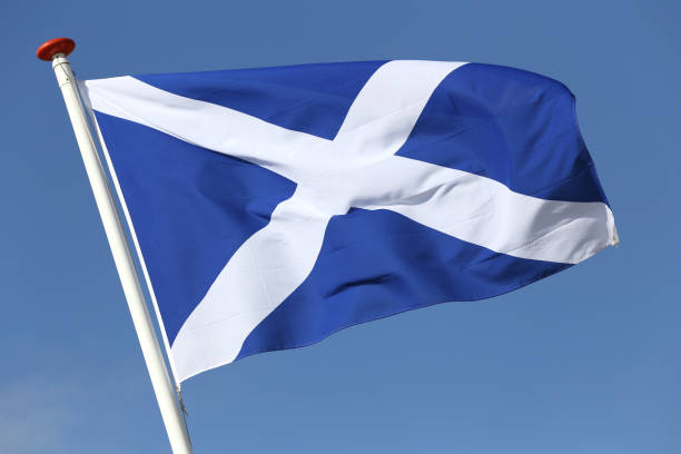 istock Scottish flag flying in the wind 1728053246