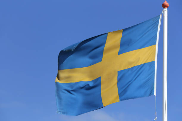istock Swedish flag flying in the wind 1728054311