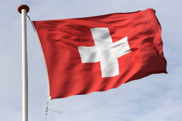istock Swiss flag flying in the wind 1728054878