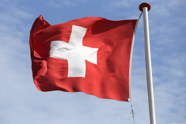 istock Swiss flag flying in the wind 1728054885