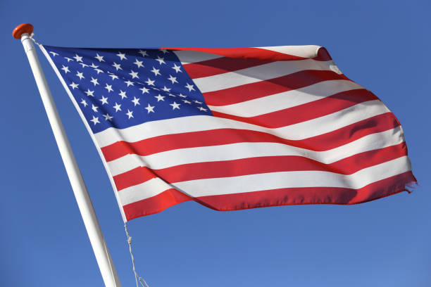 istock US flag flying in the wind 1728056070