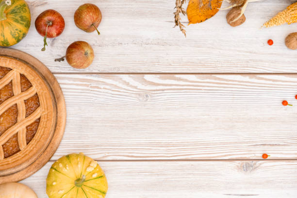 istock Pumpkin Pie on Wooden Table 1728057589