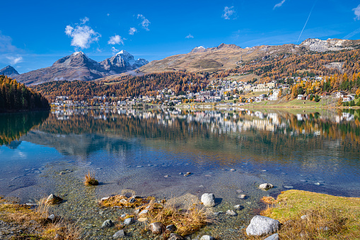 Picturesque view of Lake Saint Moritz on a calm sunny day in late October.