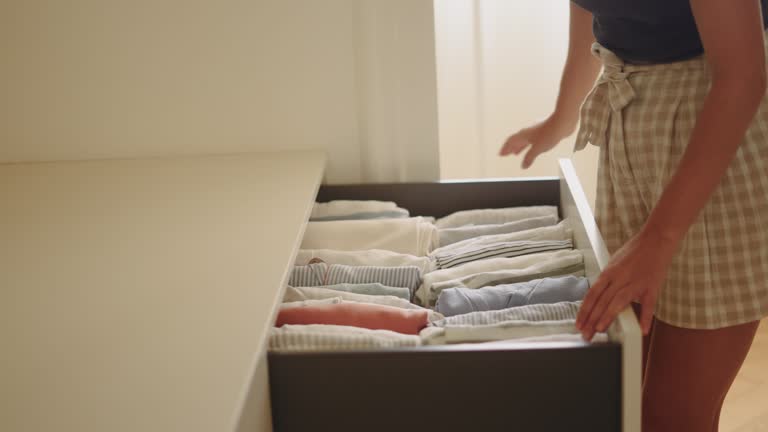 Woman folding clothes