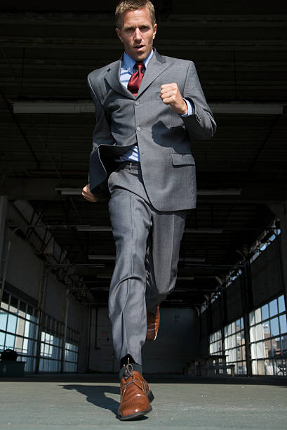 istock Businessman Runs Out of Warehouse 172805945