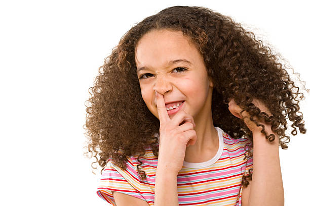 istock Little girl giggles and picks nose 172806034