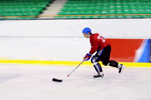 Ice hockey player in motion