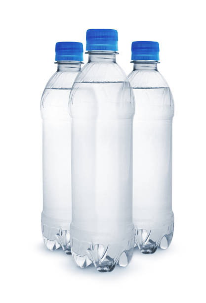 This close-up captures the detail of blue tethered caps on clear plastic bottles, reflecting EU environmental regulation standards. It highlights design and sustainability.