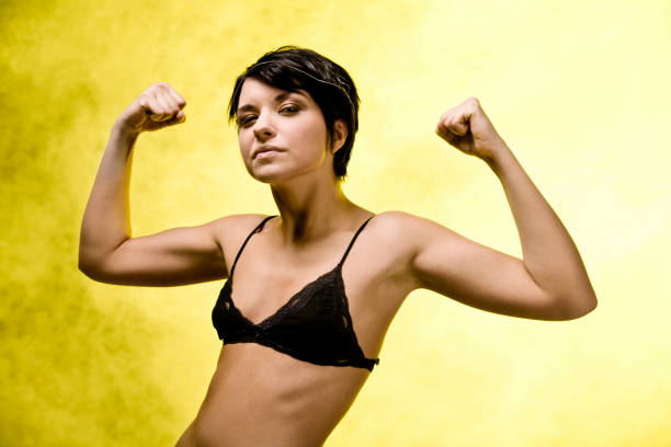 Young Woman on Yellow stock photo