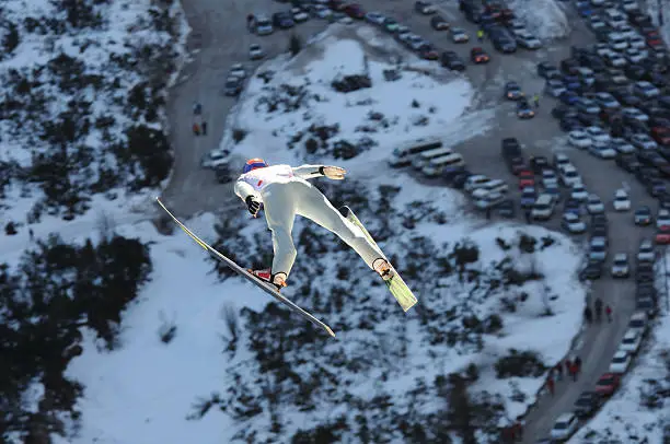 "Ski jumper flying, shot made just few moments before he left the sun and entered to the shadowFor more ski jumping action click:"