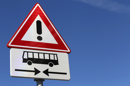 Dutch road sign: danger, busses crossing ahead