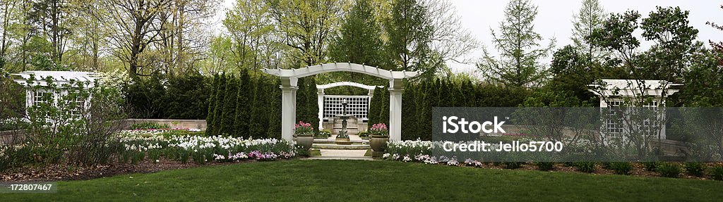 Spring Garden Garden in spring with flowers blooming Arch - Architectural Feature Stock Photo