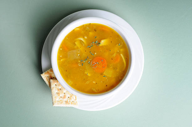 Chicken Noodle Soup A delicious bowl of chicken noodle soup. bowl of soup stock pictures, royalty-free photos & images