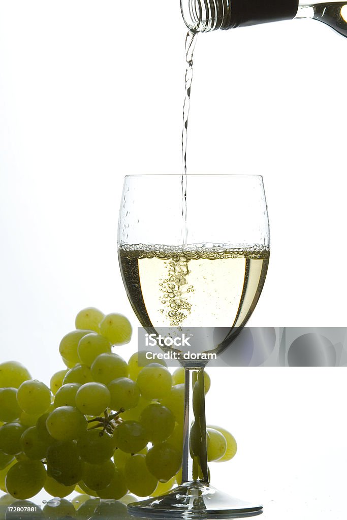 White wine "A glass of white wine  with grapesTaken in RAW,post processing with CS3" Alcohol - Drink Stock Photo