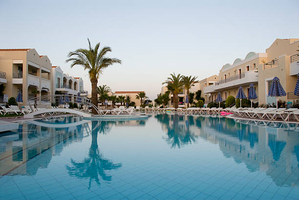 istock hotel swimming pool at dawn 172808013