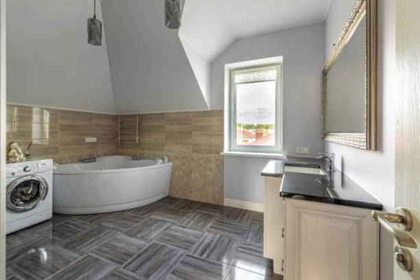 istock Spacious newempty hot tub bath tube in bathroom interior with modern tile 1728080593