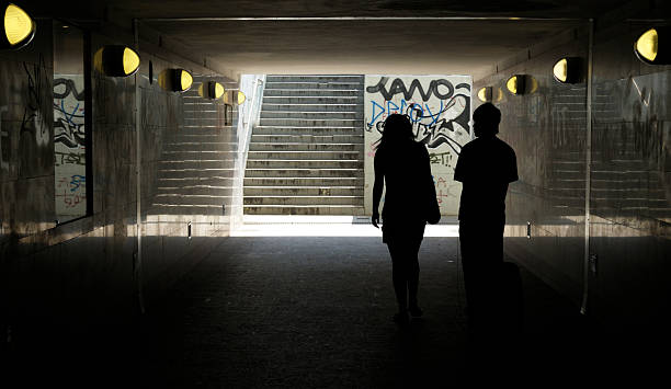 istock Two people in subway tunnel 172808760