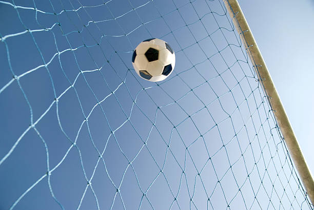 istock soccer ball in the net 172808932