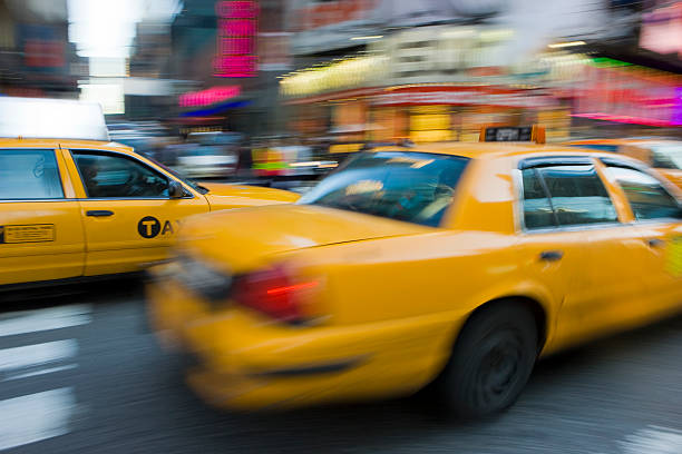 Taxi's Passing stock photo