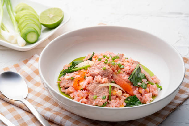 istock Thai pink fried rice in white plate 1728090015
