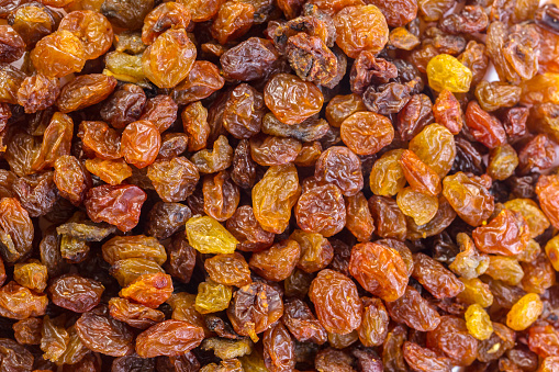 Macro photo of looking down on sun dried Raisins