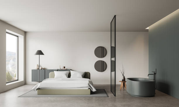 istock Stylish studio interior with bedroom and bathroom, panoramic window 1728097925