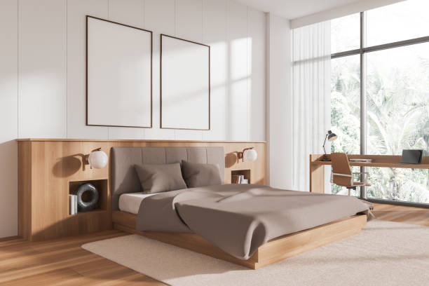 istock Cozy bedroom interior bed and work space near panoramic window. Mockup frame 1728101808