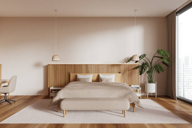 istock Beige master bedroom interior with plant 1728114025