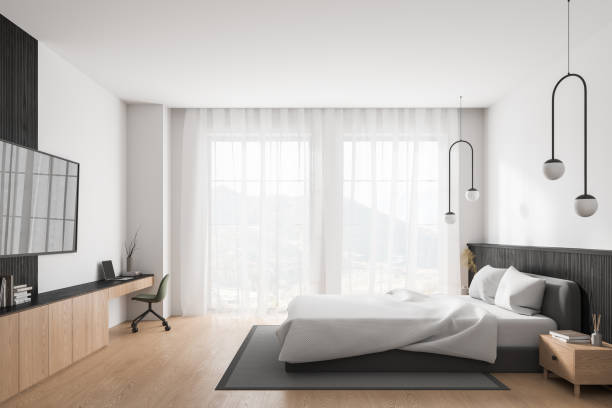 istock Light hotel interior, bed and desk with tv screen, dresser and panoramic window 1728114774