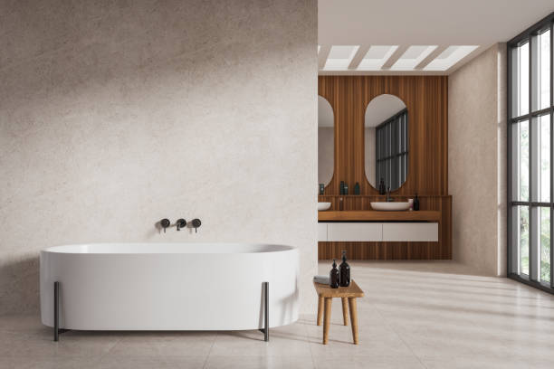 istock Modern hotel studio interior with tub, washbasin and window. Empty wall 1728115148