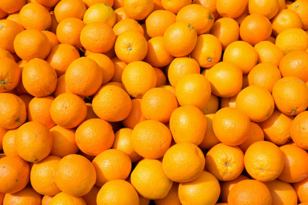 istock oranges at market 1728118504